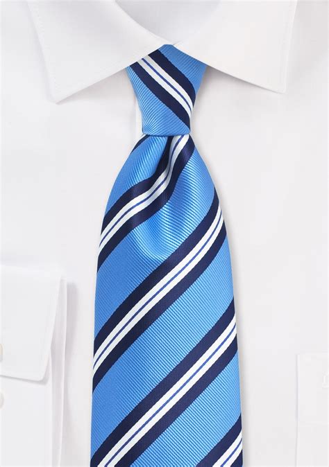 light blue striped tie.